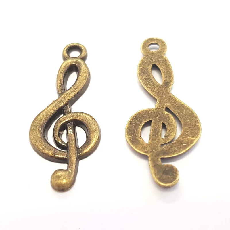 Breloque pendentif clé de sol style tibétain bronze