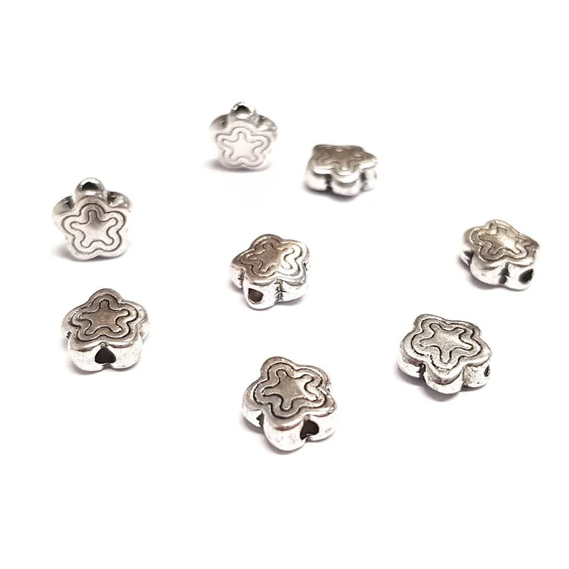 Perles métal étoile style tibétain 7 mm