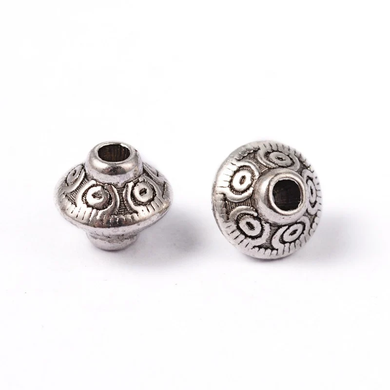 Perles toupie tibétaines en métal 6.5 x 7 mm