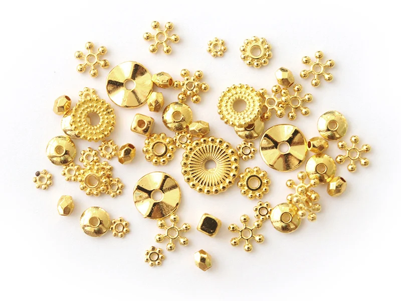 Lot de 10 grammes soit 40 pcs env d'intercalaires dorées pour perles heishi