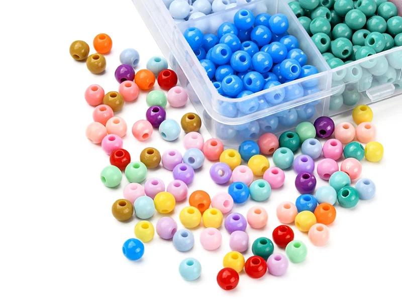 Boîte de 1500 perles - 18 couleurs de perles opaques en plastique - 6 x 5 mm