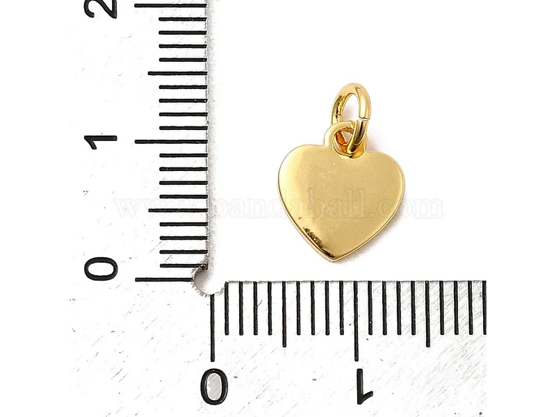 Breloque coeur avec noeud émaillé rouge - Doré à l'or fin 18K