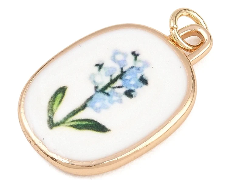 Breloque ovale fleur bleue - laiton doré clair