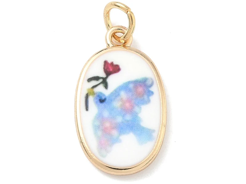 Breloque ovale motif oiseau imprimée - laiton doré