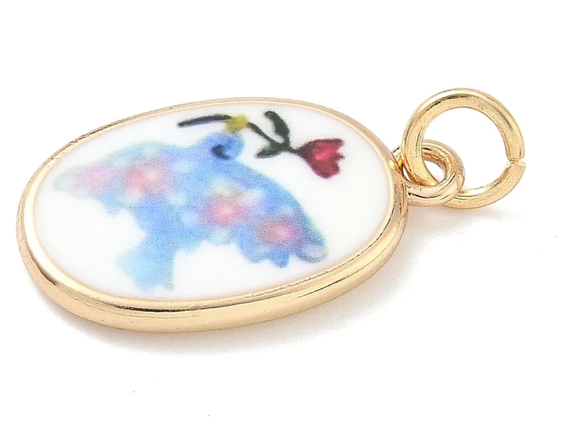 Breloque ovale motif oiseau imprimée - laiton doré
