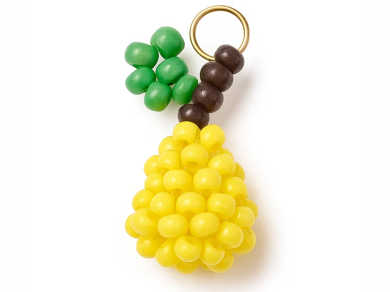 Breloque poire en perles de verre