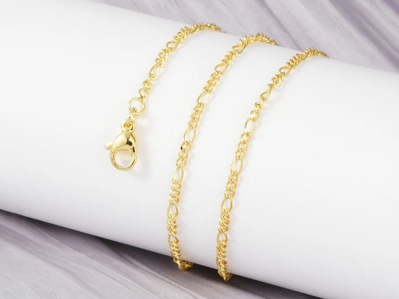 Collier chaîne figaro en laiton doré à l’or fin