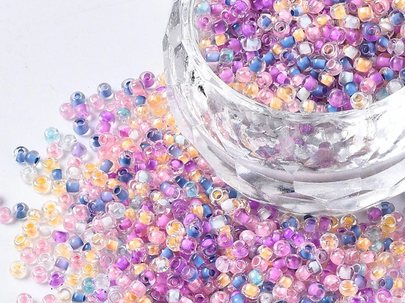 Perles de rocailles transparentes en tube - Mélange arc-en-ciel parme rosé - 2 mm