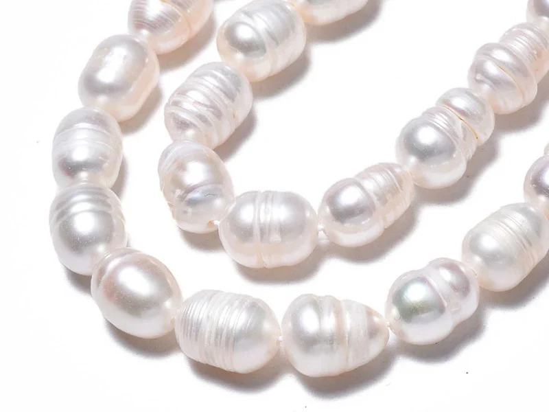 20 perles de culture forme grain de riz - 10 mm env