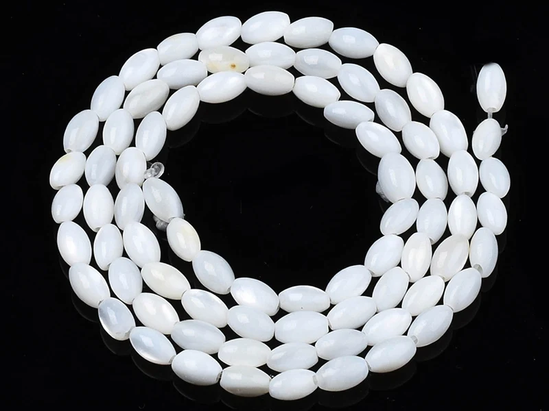 Lot de 20 perles en coquillage naturel - forme grain de riz - 5 x 3 mm