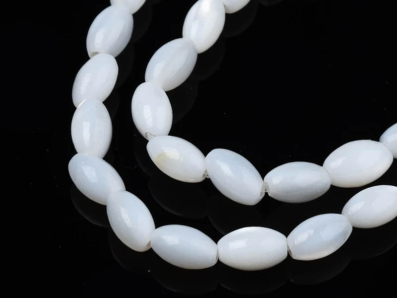 Lot de 20 perles en coquillage naturel - forme grain de riz - 5 x 3 mm