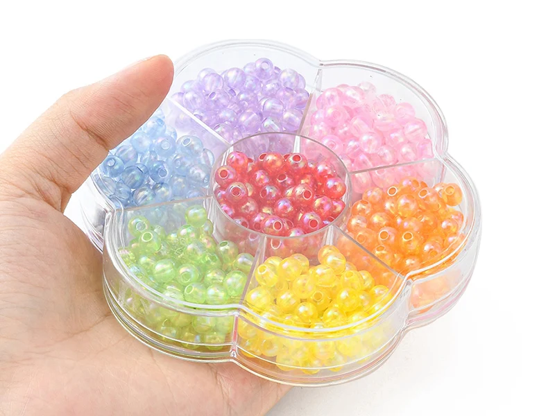 Boîte de 490 perles rondes transparentes en acrylique - 7 couleurs - 6 mm