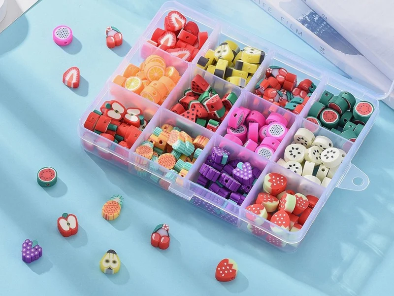 Boite de 12 compartiments de perles fruits en pâte polymère - Multicolore