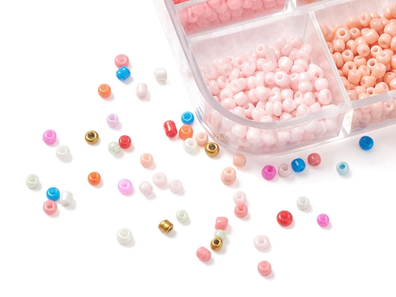 Boite de 12 couleurs estivales de perles de rocailles rondes - 2mm - 3000 pcs environ