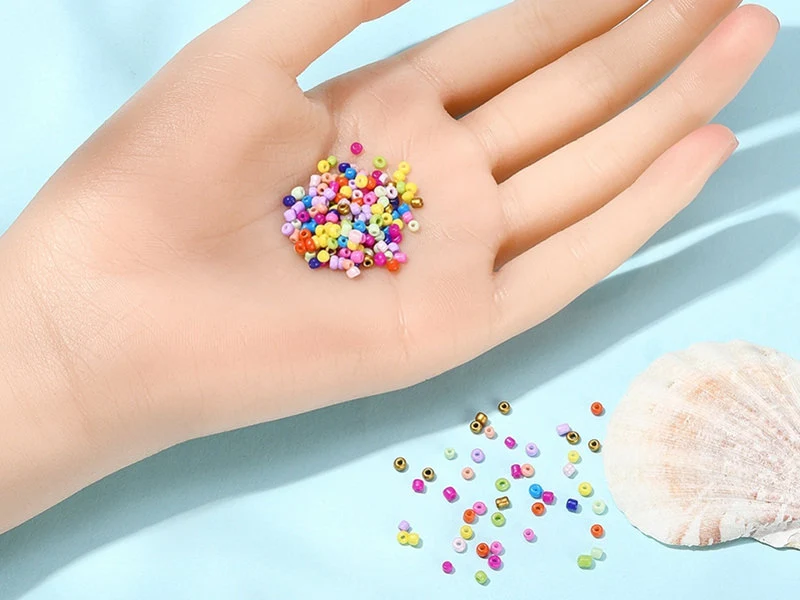 Boite de 12 couleurs pop de perles de rocailles rondes 12/0 - 2 mm - 15000 pcs