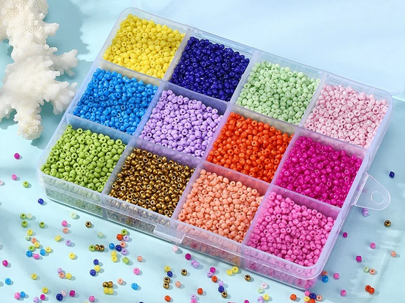 Boite de 12 couleurs pop de perles de rocailles rondes 12/0 - 2 mm - 15000 pcs