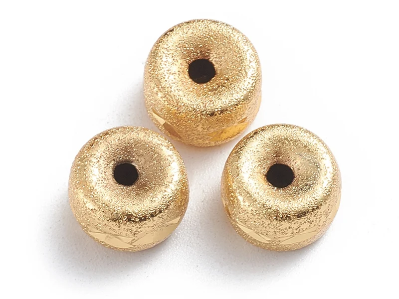 Perle intercalaire pour bijoux dorée - 10 x 6 mm
