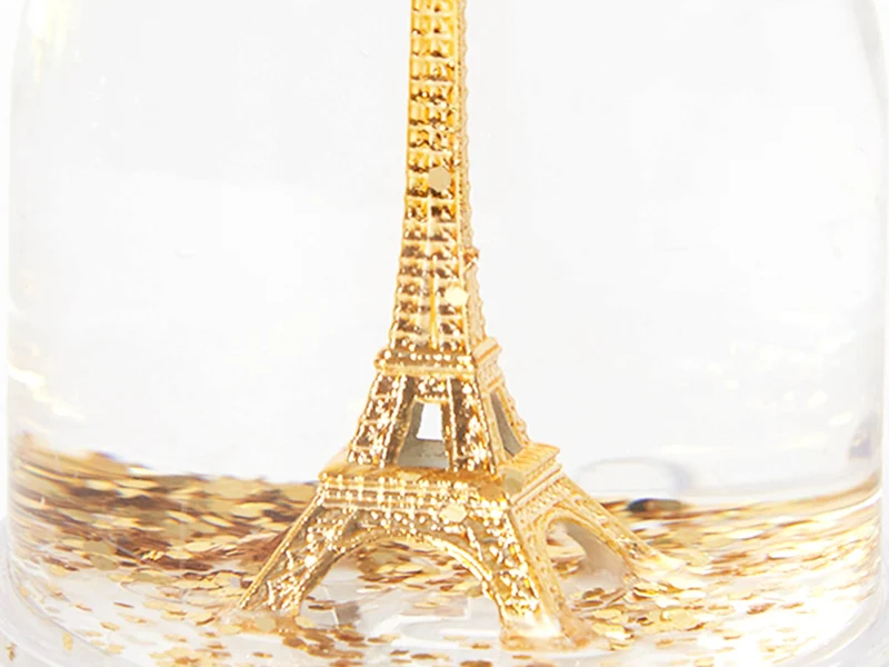 Boule à neige Tour Eiffel - Paillettes dorées