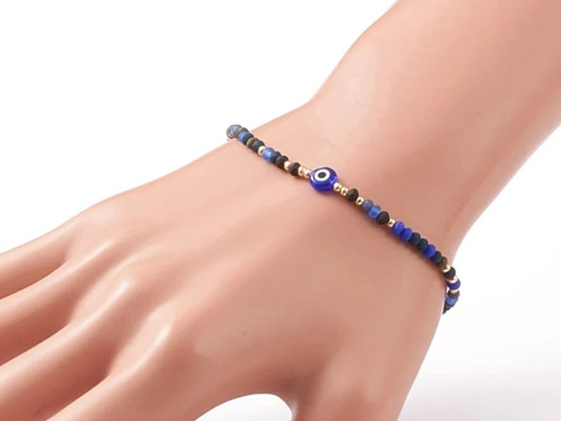 Bracelet perles œil bleu - porte bonheur - taille ajustable