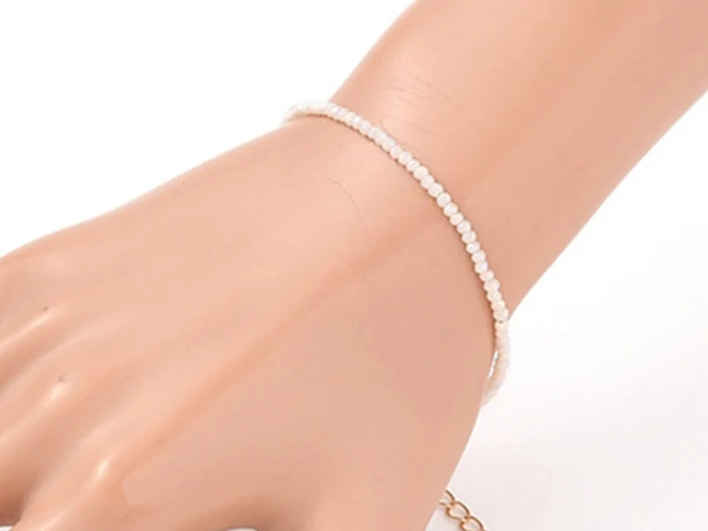Bracelet en perles facétées - rose brume