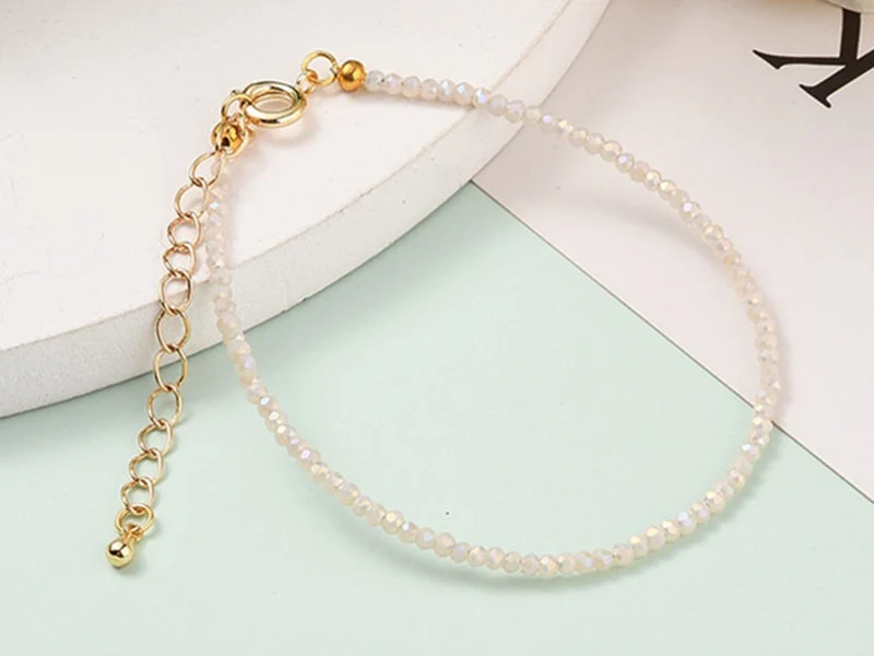 Bracelet en perles facétées - rose brume