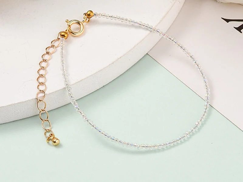 Bracelet en perles facétées - blanc irisé