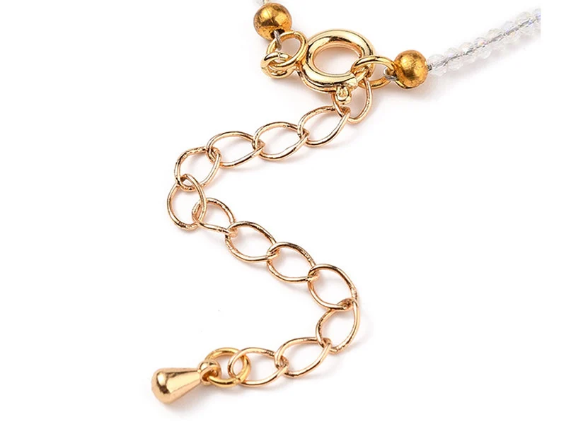 Bracelet en perles facétées - blanc irisé