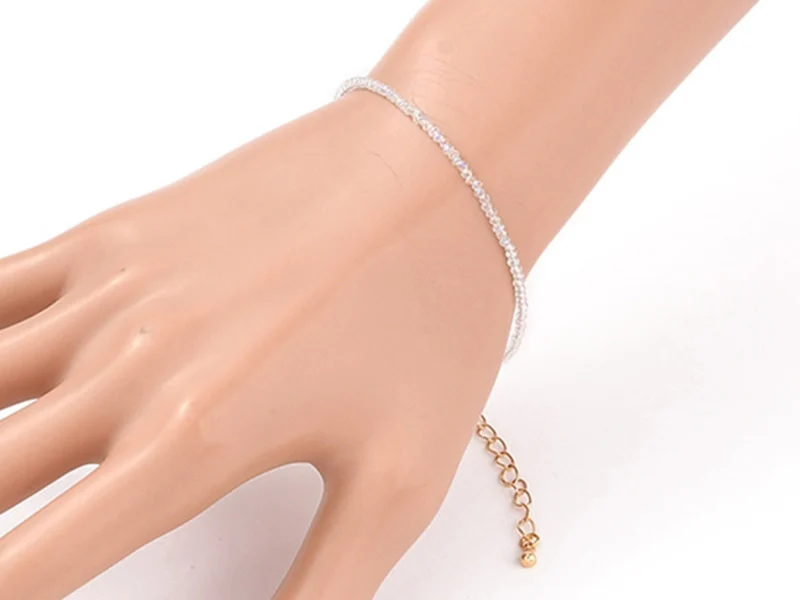 Bracelet en perles facétées - blanc irisé