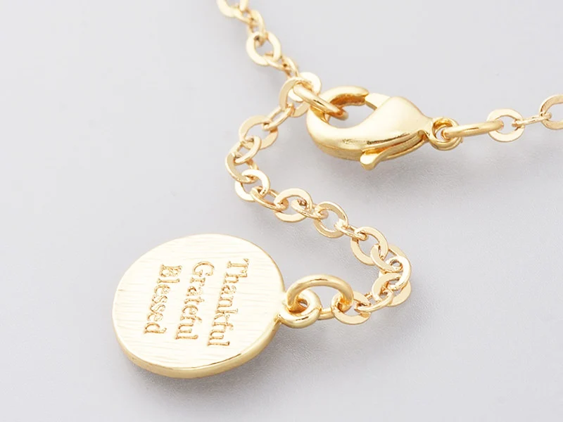 Bracelet avec véritables perles de culture et chaine doré à l'or fin 18K