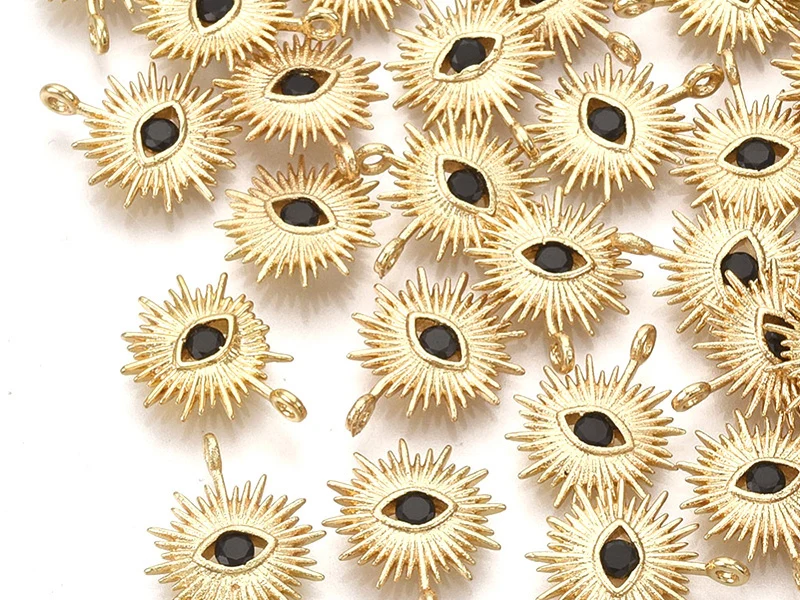 Breloque dorée à l'or fin 18K – Soleil avec œil strass noir