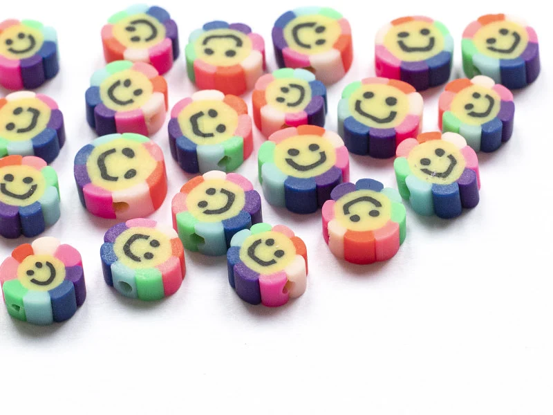 20 perles fleur sourire en pâte polymère - 9 mm
