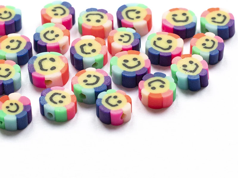 20 perles fleur sourire en pâte polymère - 9 mm