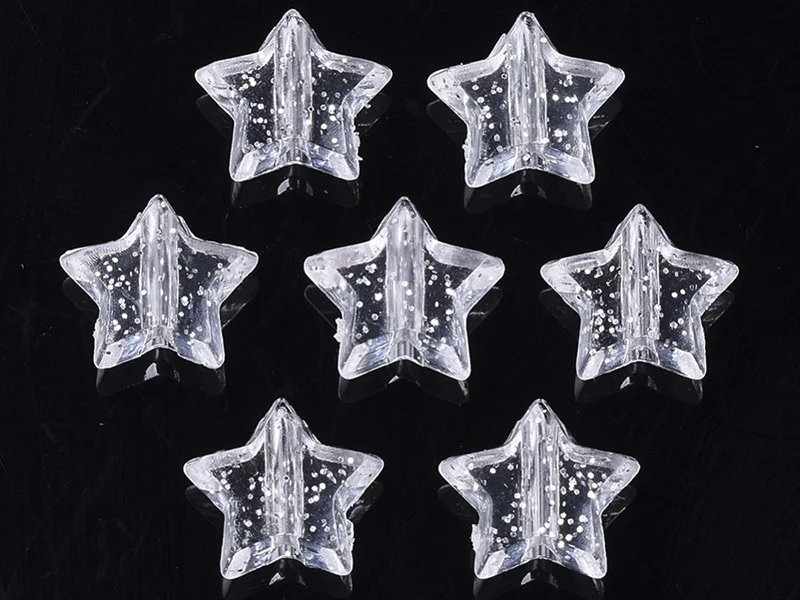 50 perles en plastique - étoiles transparentes à paillettes - 10 mm