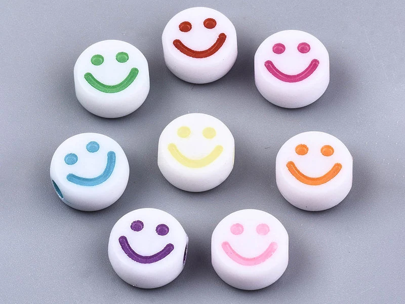 20 perles en plastique rondes symbole sourire - blanc et multicolore - 7 mm