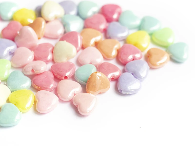 50 perles cœurs nacrés - 12 mm