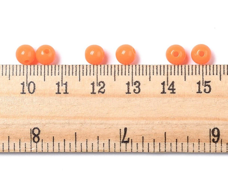 100 perles en plastique rondes 6 mm - orange fluo