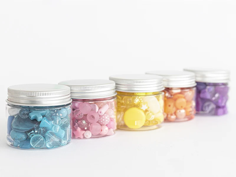 Pot de perles en plastique - nuances de bleu