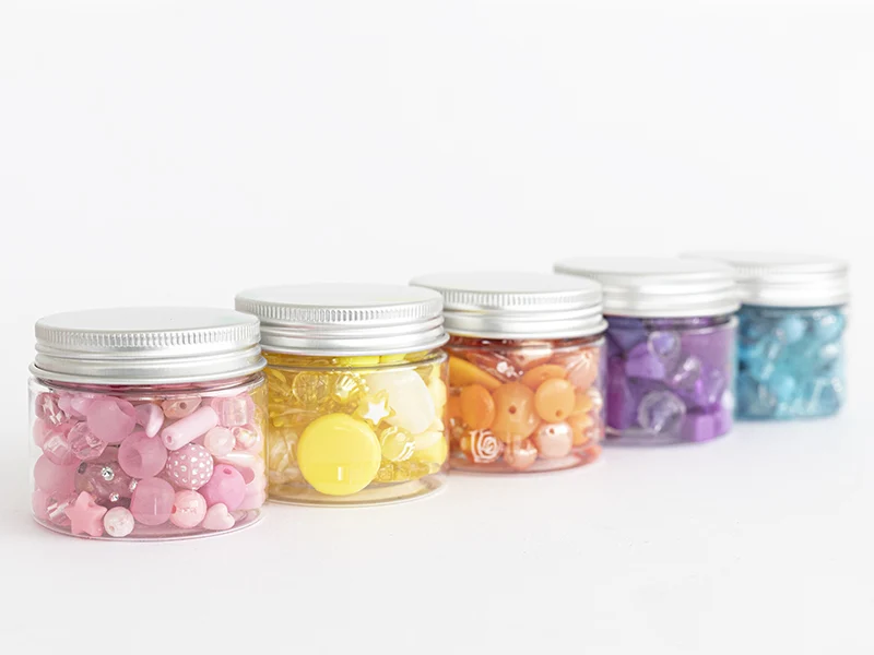 Pot de perles en plastique - nuances de rose