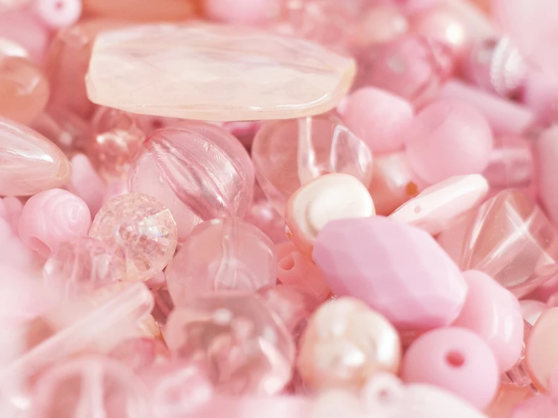 Pot de perles en plastique - nuances de rose