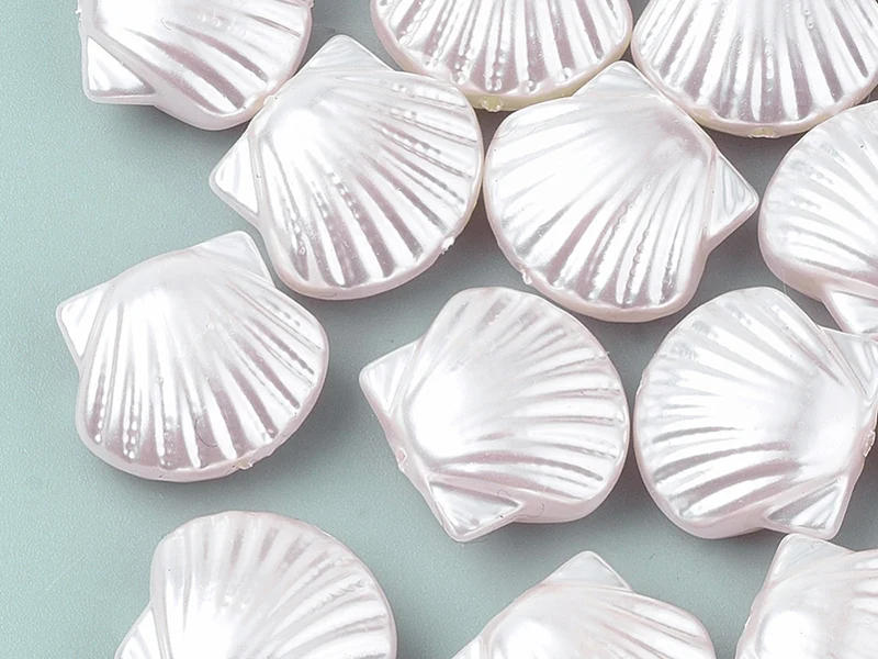 5 perles coquillages en plastique