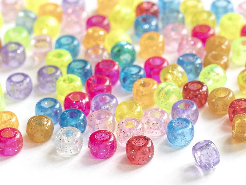 100 perles en plastiques basiques pour enfants - multicolore à paillettes - 9x6 mm