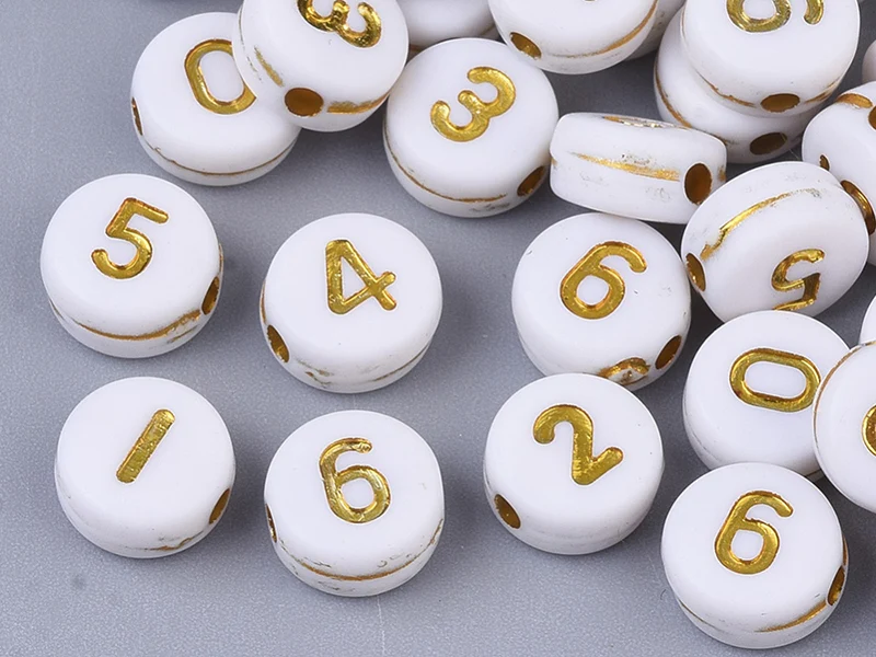 200 perles rondes en plastique - chiffres - blanches et dorées