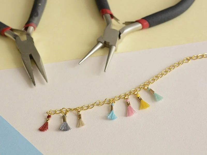breloque mini-pompon - beige