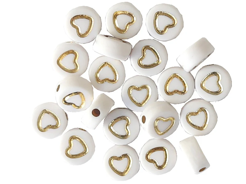 Lot de 20 perles rondes - Coeurs dorés