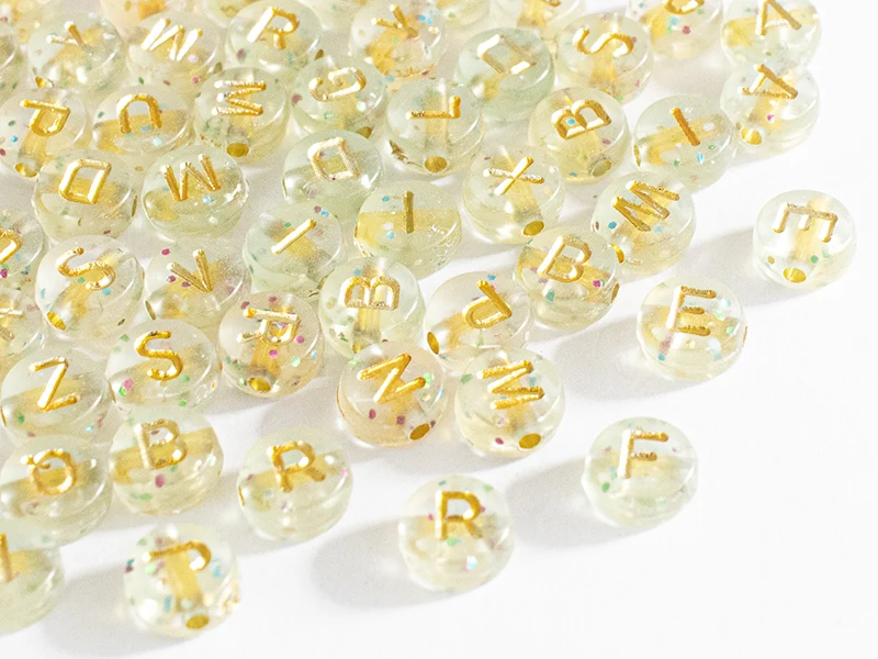 Lot de 200 perles rondes à paillettes - Lettres alphabet dorées