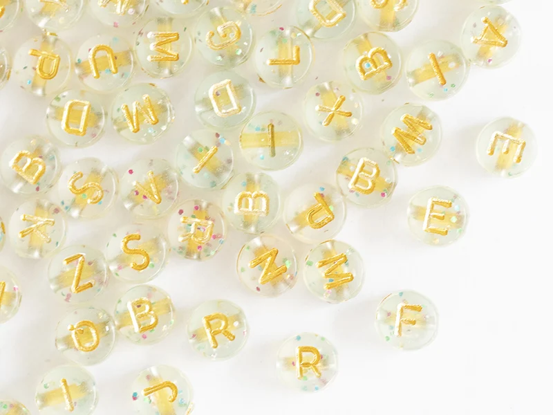 Lot de 200 perles rondes à paillettes - Lettres alphabet dorées