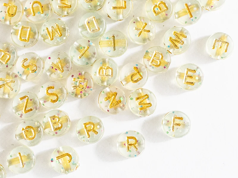 Lot de 200 perles rondes à paillettes - Lettres alphabet dorées