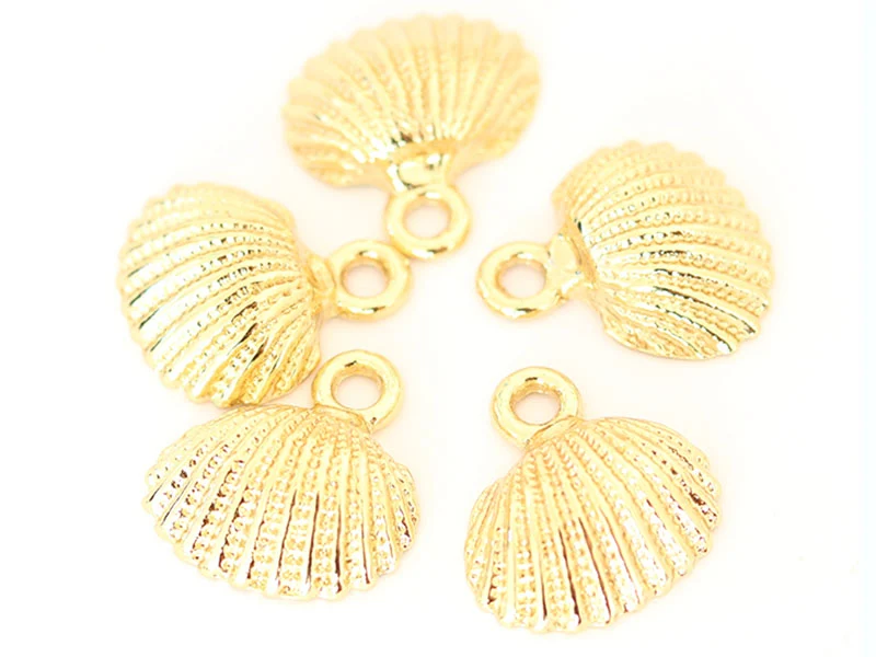 Pendentif coquillage 18 mm - laiton doré