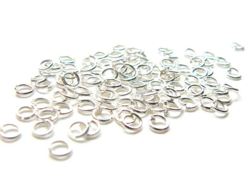 100 anneaux 3 mm argentés clair
