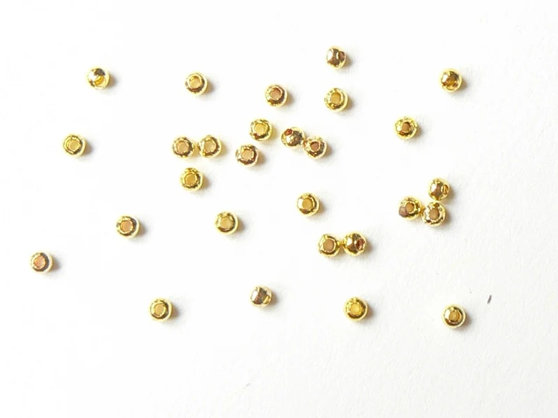 100 perles en métal dorées - 2,4 mm